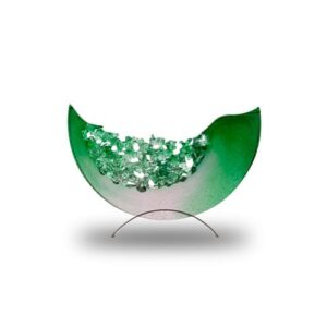 A green and white curved glass bowl with clear decorative stones inside, displayed on a metal stand against a white background.