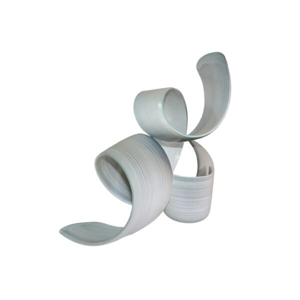 A modern abstract sculpture featuring three interconnected, curved, ribbon-like forms in a smooth, light gray finish, set against a white background.