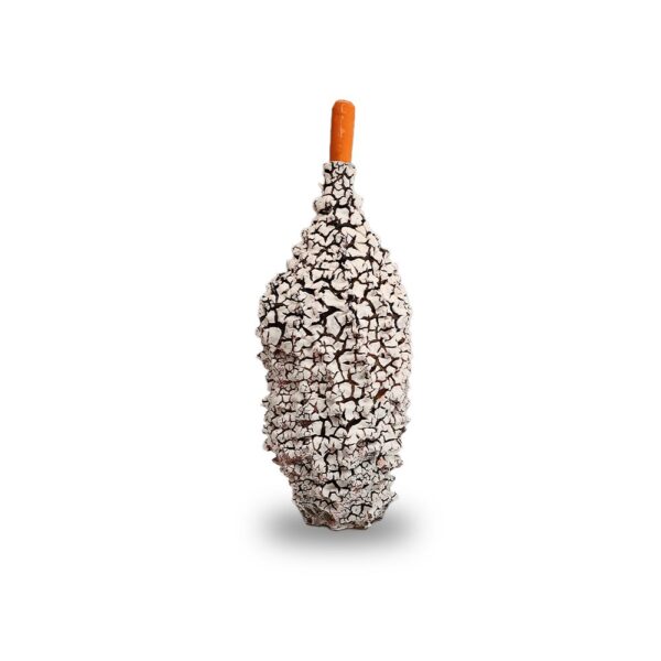 A bottle-shaped object with a rough, cracked white surface and an orange neck, standing upright against a white background.
