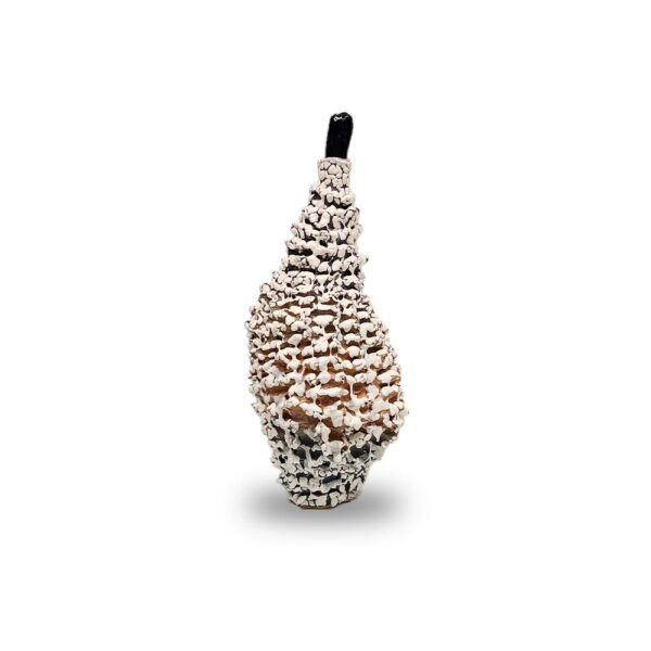 A ceramic pear-shaped sculpture with a black stem and a textured white and brown surface, set against a white background.