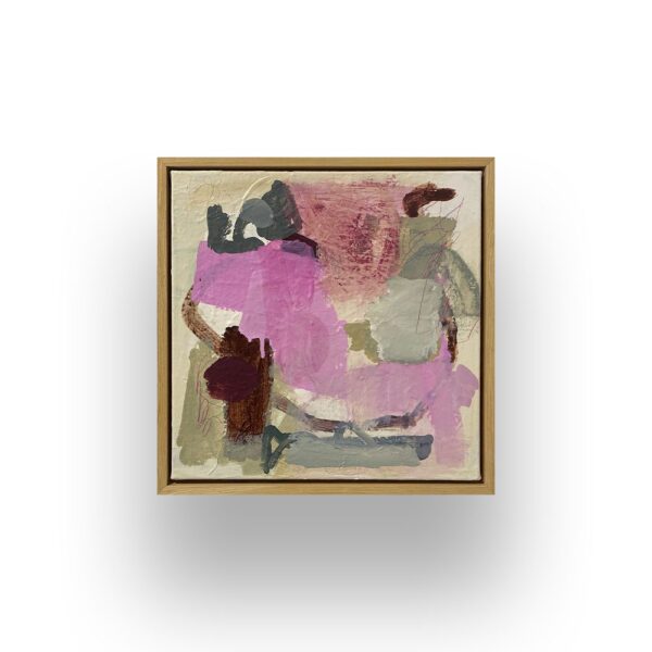 Abstract painting with pink, burgundy, gray, and beige shapes on a textured canvas, framed in light wood, set against a white background.